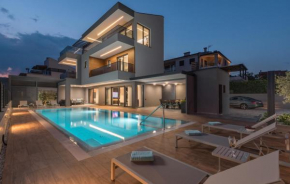 Villa Bellatrix in Fažana with beach front and sea view
